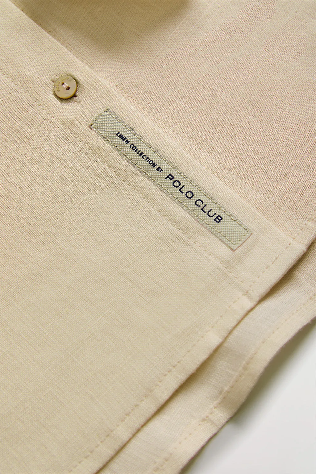 Camisa de lino beige con detalle bordado