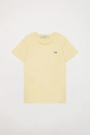 Camiseta orgánica de manga corta amarilla Neutrals kids con logo