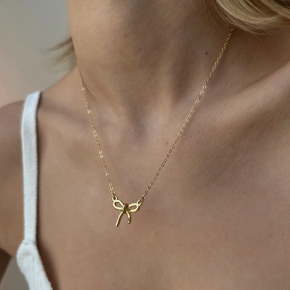 GOLDEN BOW COQUETTE NECKLACE