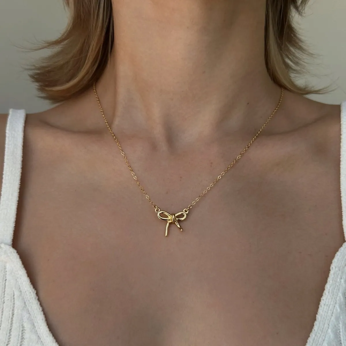 GOLDEN BOW COQUETTE NECKLACE